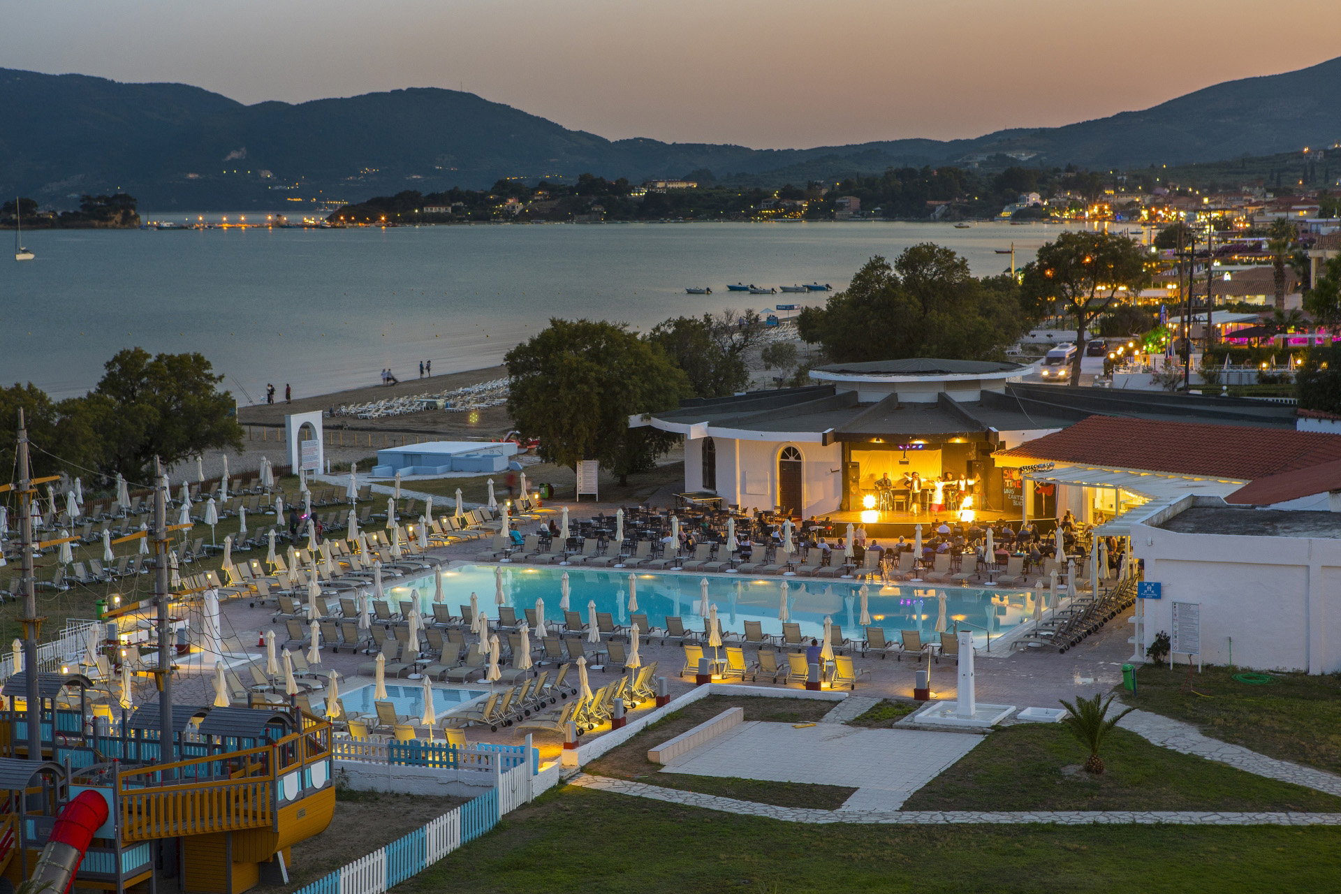 Image: http://www.bookyourweddingday.com/images/media/uploadfiles/hd_louis-zante-beach-panoramic-night-shot_1531823399.jpg